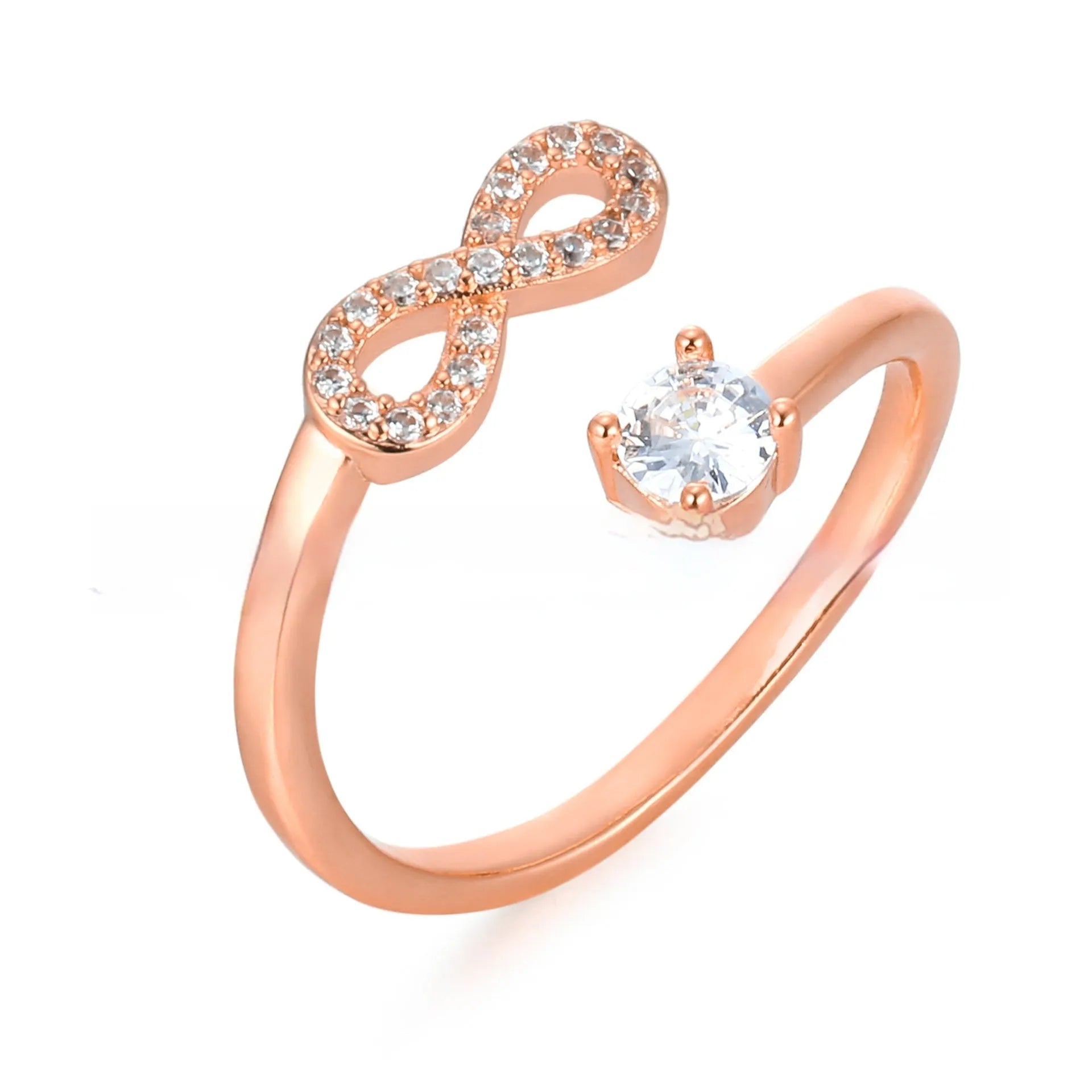 Geometric open ring with a zircon stone, personalised with a letter on a model finger.
