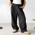 Men's loose fit linen pleated high waist jogger trousers in cotton fabric with elasticated waistband