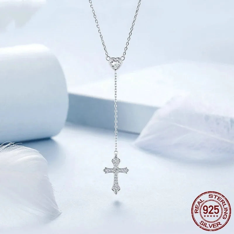 Silver cross necklace with O-ring chain in BSN384 colour, showing V-neck design