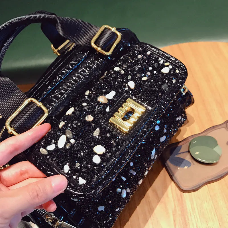Large capacity black cowhide shoulder bag with diamond pattern for women, suitable for leisure travel and casual daily use.