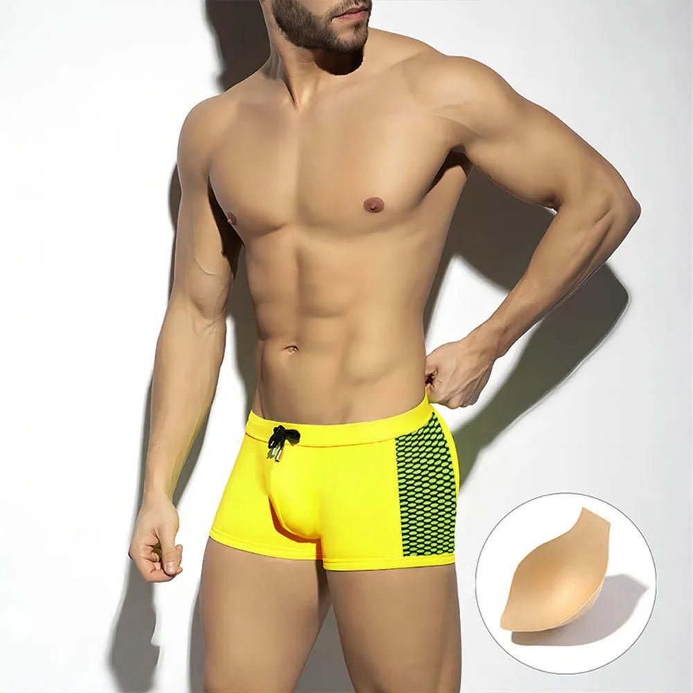 Men's polka dot print quick-dry swimming boxers in black, dark blue, and yellow colour options.