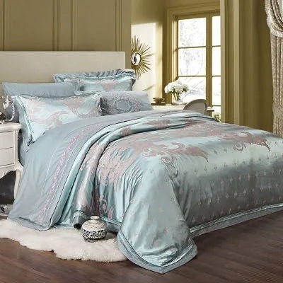 Cotton bedding set with floral plant pattern, satin weave, and embroidery quilting in blue and white colourway