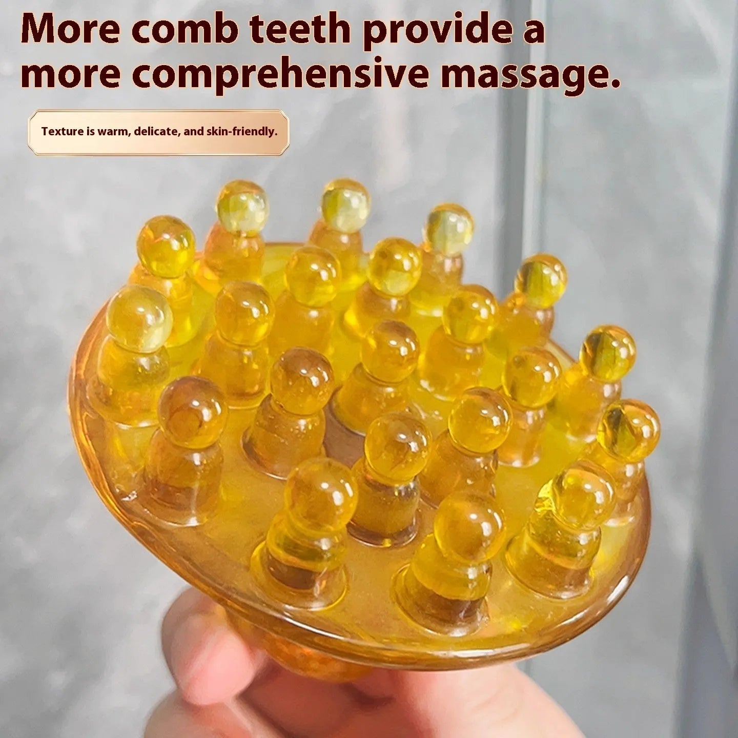 Brown and yellow disc-shaped massage comb with 21 teeth for scalp and meridian stimulation