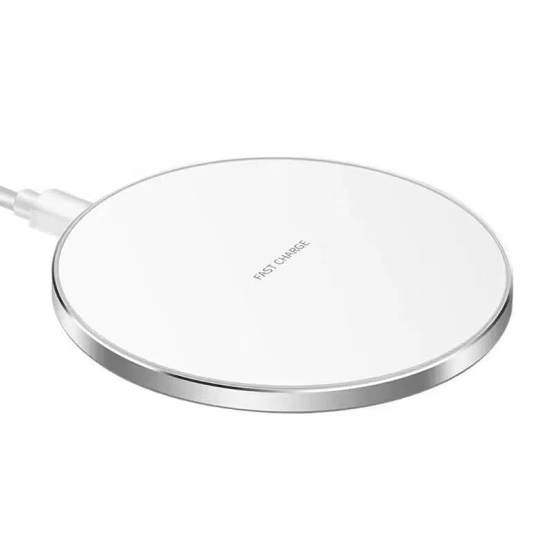 Black 15W fast wireless charger pad with type C cable on a desk