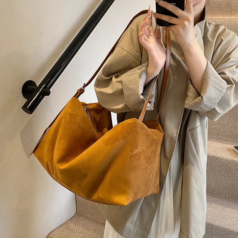 Women's large capacity suede pillow shoulder bag in PU leather, black colour, with outer slit pocket
