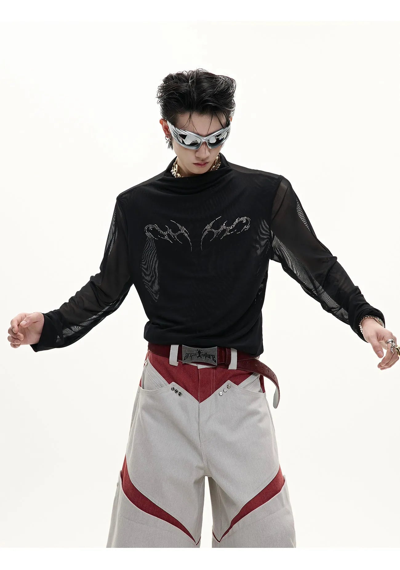 Black mesh slim-fit long sleeve bottoming shirt on a hanger, showing its lightweight texture and close cut.