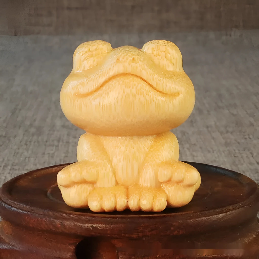Solid bamboo carved smiling frog ornament with cartoon cute style, measuring 5cm high.