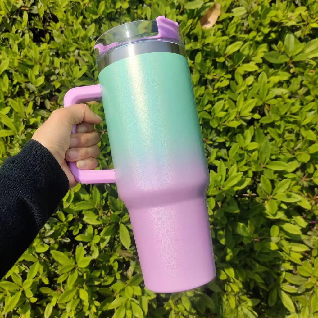 Large stainless steel vacuum insulation cup with gradient colour finish showing 1L capacity dimensions