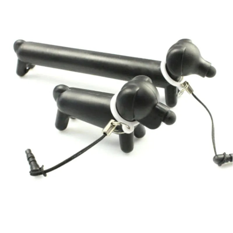 Black dog-shaped touch screen stylus shown with phone holder configuration