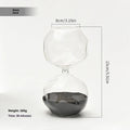 Borosilicate glass sand timer with coloured sand in a European-style blown glass hourglass