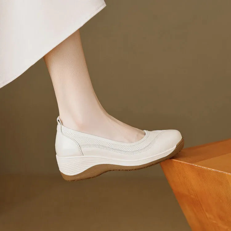 Beige cowhide leather platform slip-on pumps with round head and thick sole on white background