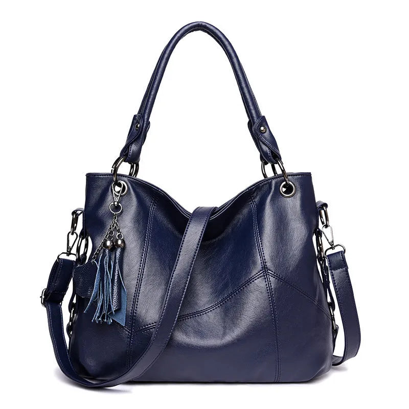 Women's PU tassel crossbody shoulder bag in bucket shape with three straps, available in black, blue, taro purple, wine red