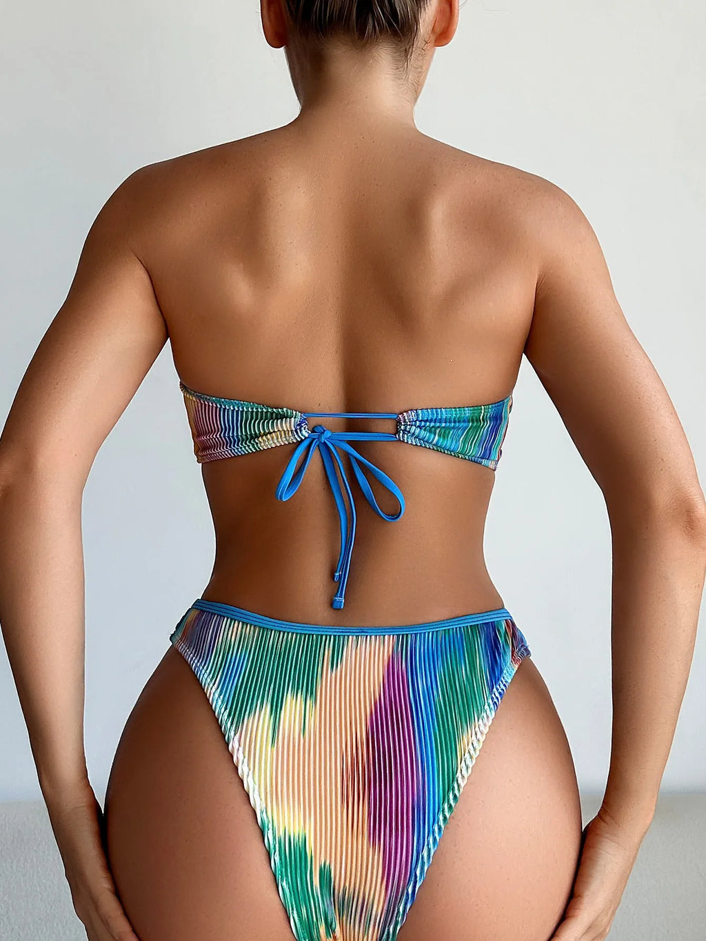 Colour printed tube top bikini set with matching briefs on a white background