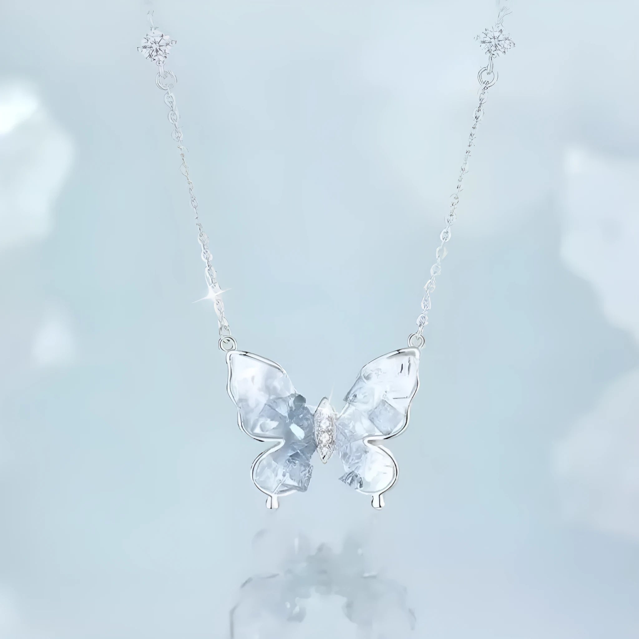 S925 sterling silver necklace with a detailed ice rain butterfly pendant on an adjustable O-ring chain.