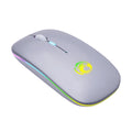 Black and white luminous charging silent wireless mouse on a desk with adjustable DPI and Bluetooth connectivity.