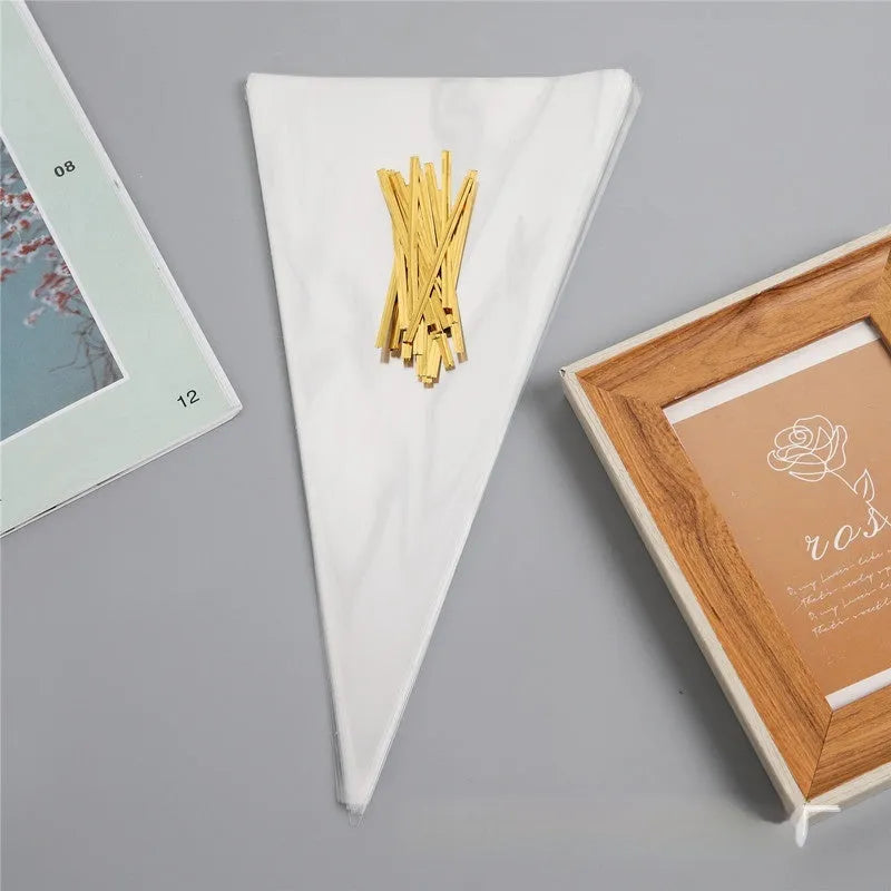 Clear triangular OPP plastic packaging bag showing the integrated tie wire closure at the top.