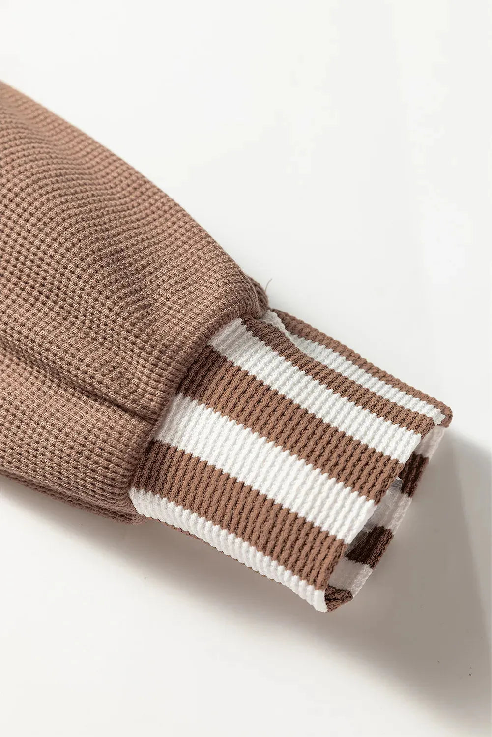 Straw yellow striped patchwork hoodie with waffle texture fabric and a drawstring hood.