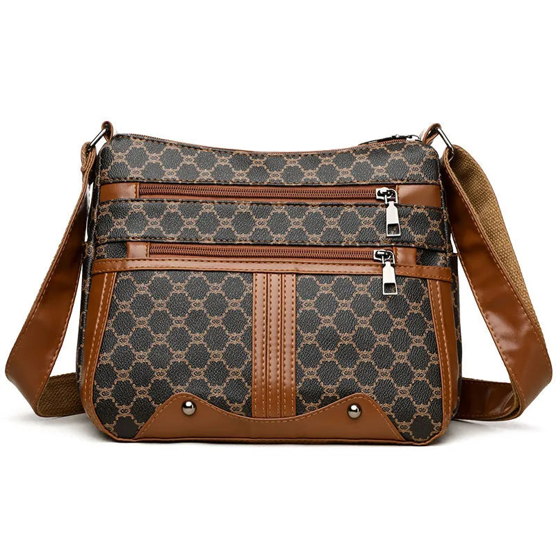 Brown stitching pattern crossbody bag with adjustable strap and polyester lining