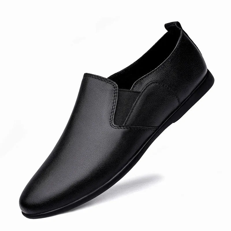 Men's black and brown cowhide leather shoes with round toes on a white background.