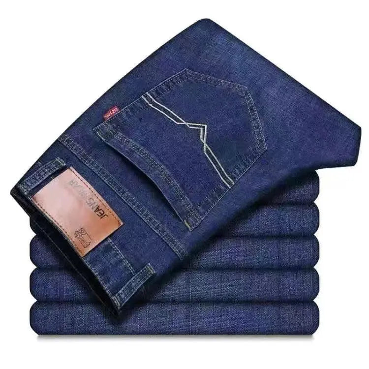 Elastic men's straight tube loose casual jeans in denim, blue colour, side view showing straight leg and waistband