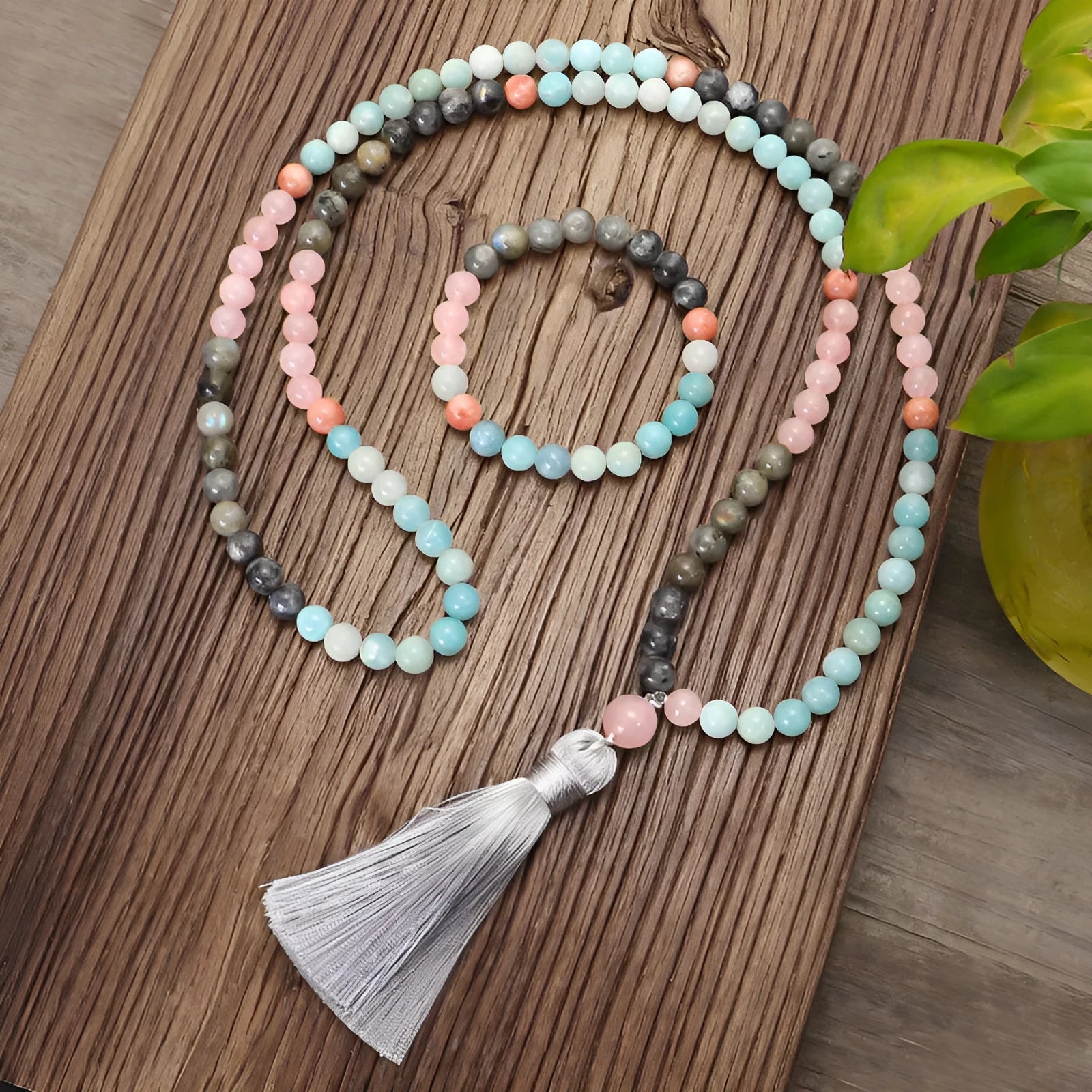 Bohemian 108 colour stone necklace with tassel pendant and matching bracelet on display