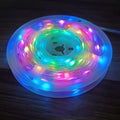 Long 10-metre multi-colour LED party light string with 100 lights coiled on a reel.