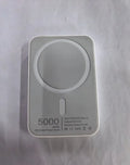 White wireless power bank with magnetic charging surface showing 5000mAh capacity label