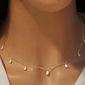 Drop-shaped artificial zircon necklace on an adjustable O-chain in silver, rose gold, or golden yellow finish.
