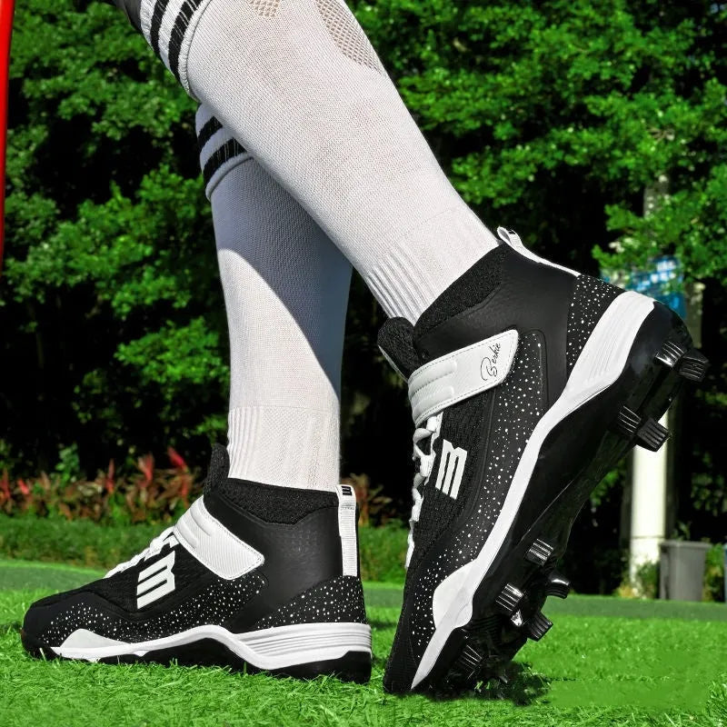 Black and white unisex adult baseball training sneakers with Velcro strap and wear-resistant rubber sole.