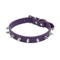 Studded black PU leather dog collar with metal studs and alloy buckle on a grey background.