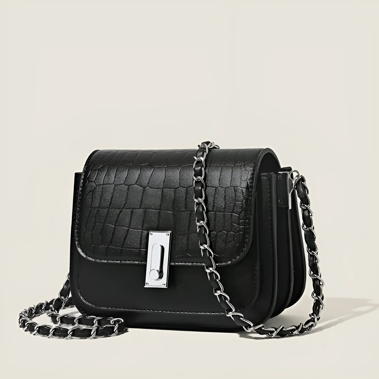 Women's black soft PU chain shoulder bag with square shape and cross-body strap.