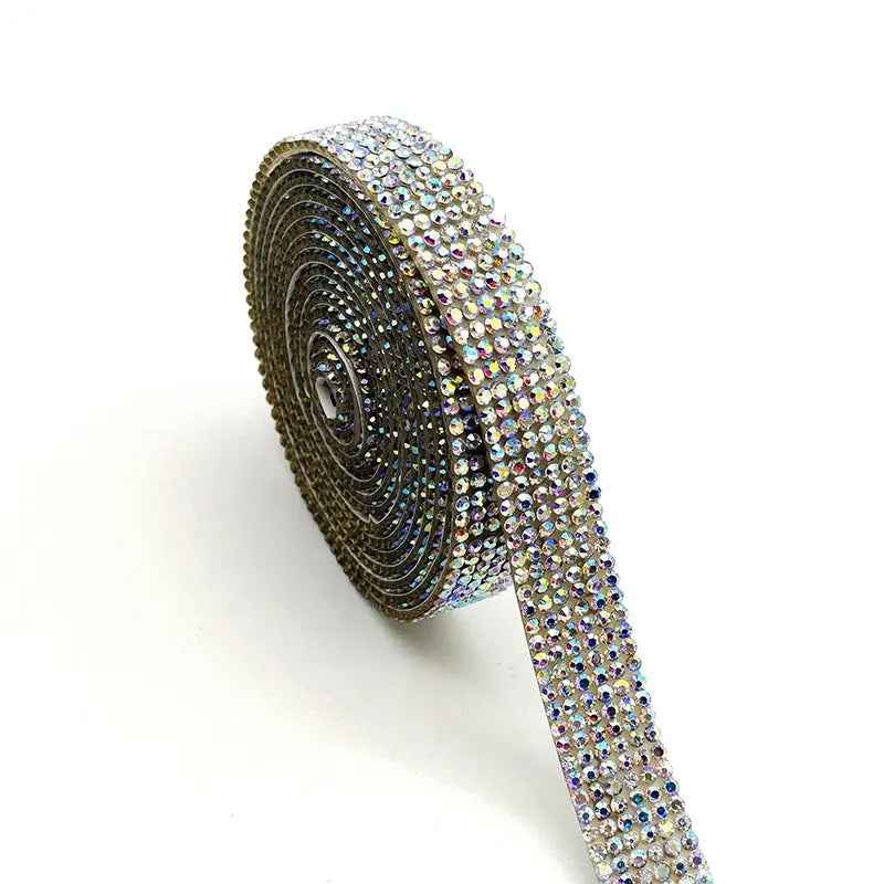 Self-adhesive glass water drill strip on a 1-yard roll for clothing and shoe decoration.