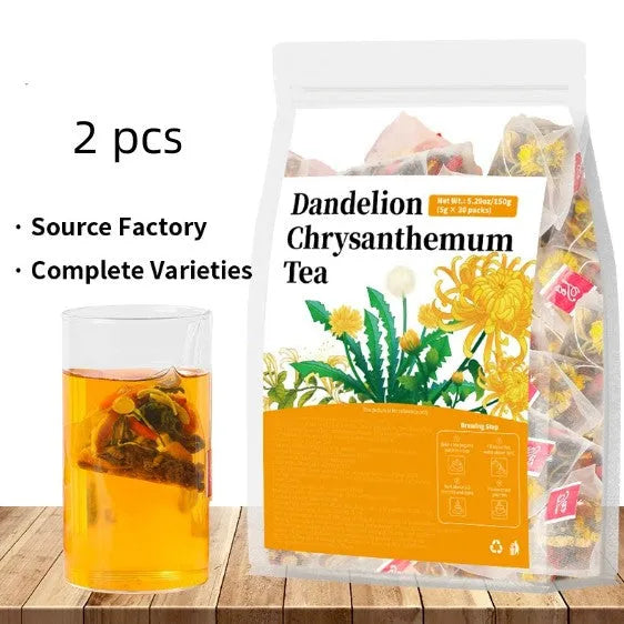 Dandelion Chrysanthemum herbal loose leaf tea blend in a bowl with a spoon