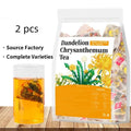 Dandelion Chrysanthemum herbal loose leaf tea blend in a bowl with a spoon