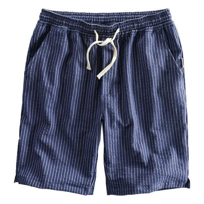 Men's striped casual shorts in cotton, shown in a loose straight-leg fit on a mid-waist.