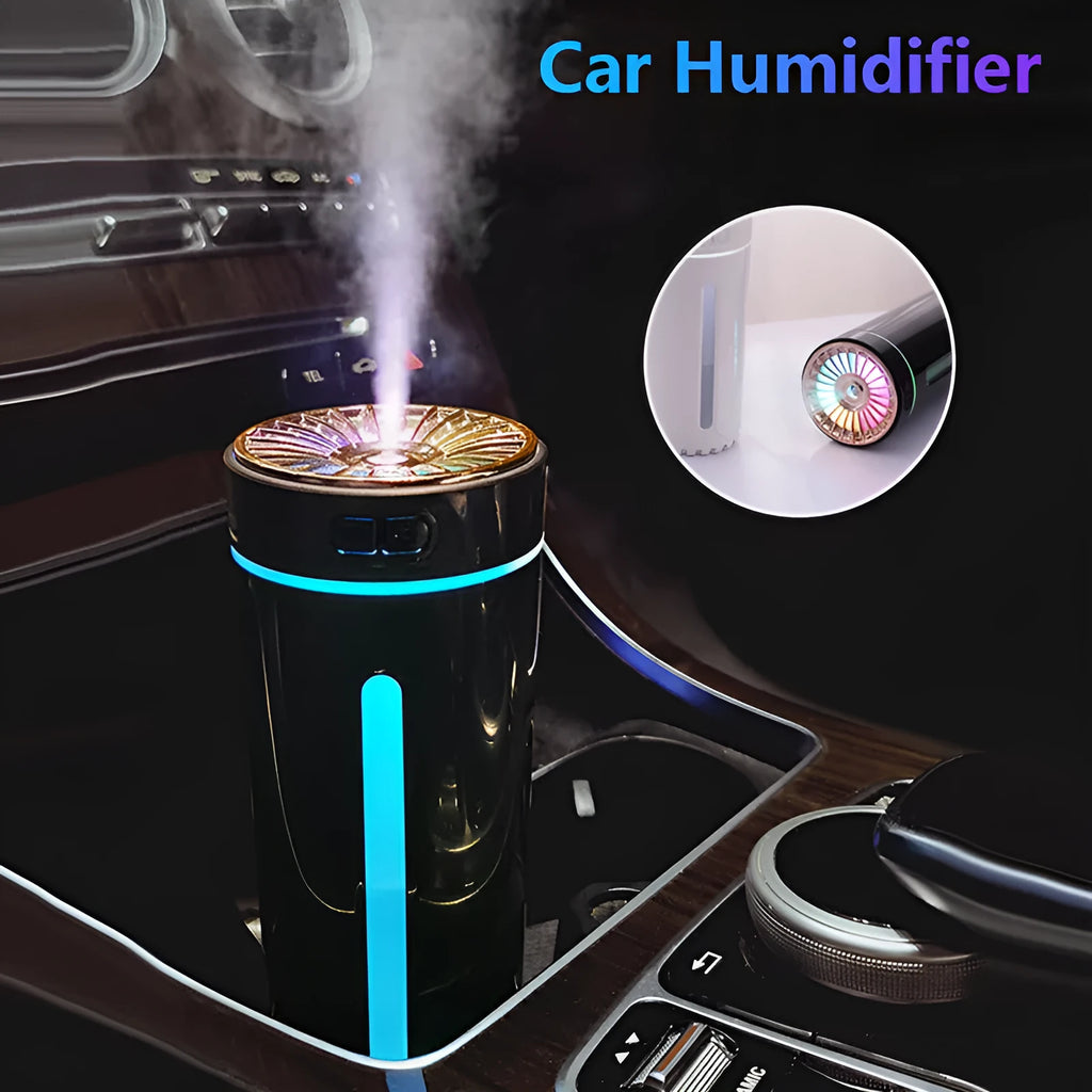 Black wireless portable humidifier with colourful lights beside car cup holder