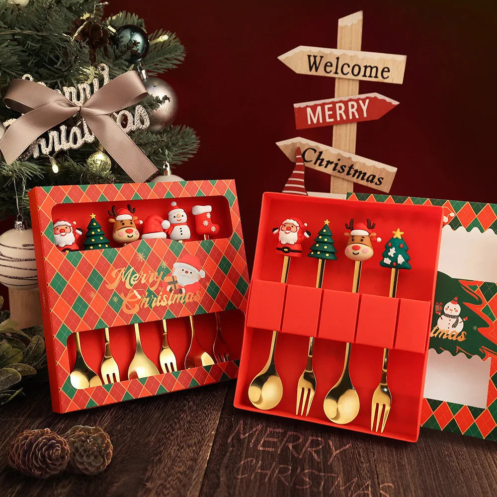 Stainless steel Christmas spoon and fork set with snowman and tree designs on handles