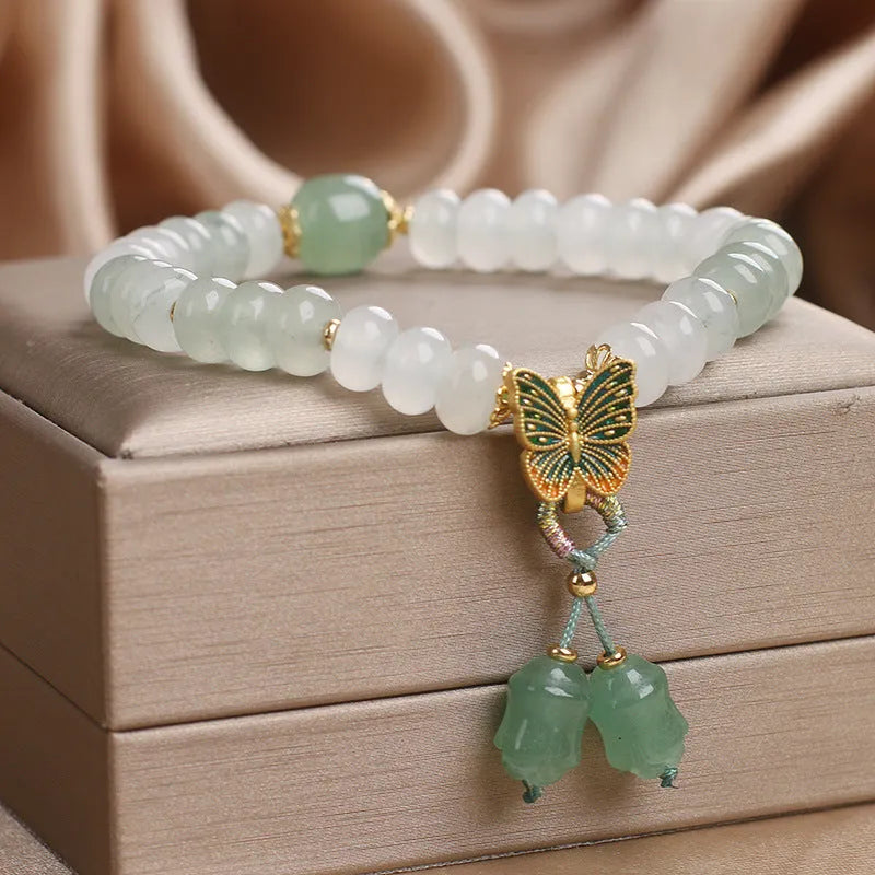 Green Tian Shan Cui abacus beads jade bracelet with retro butterfly and crystal tassel decoration