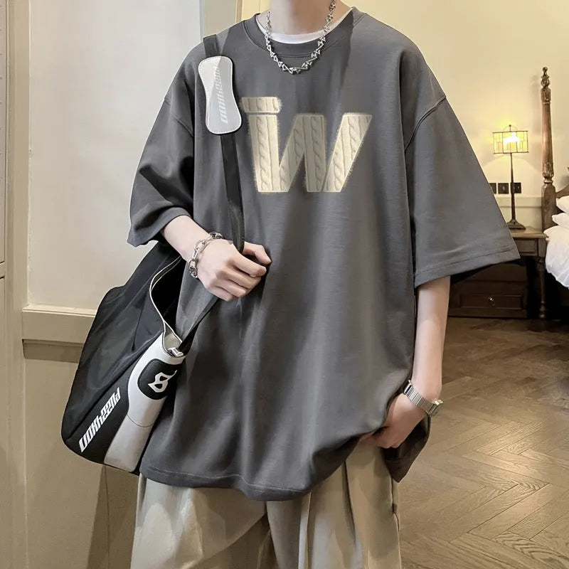 American retro cotton T-shirt with letter print, half sleeves, drop-shoulder loose fit, available in six colours and sizes M to XXXL.