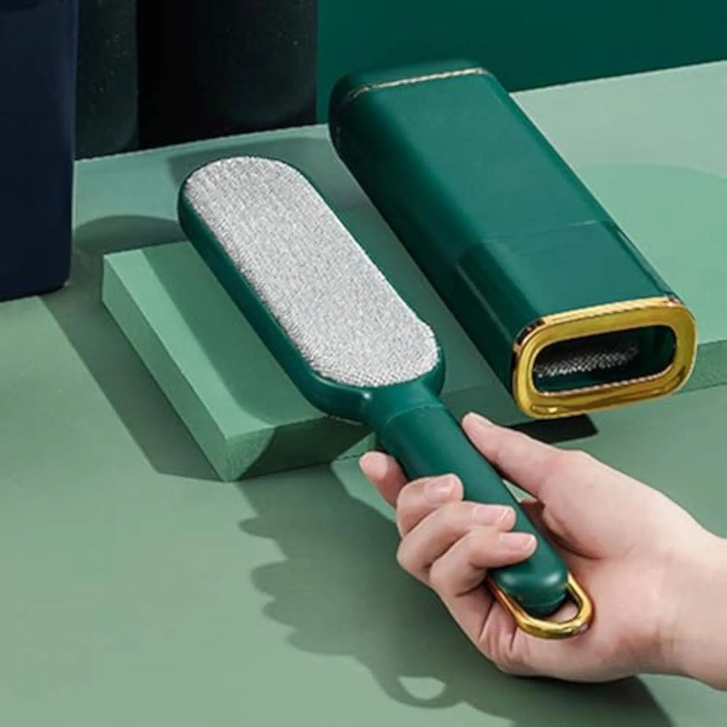 Double-sided pet hair removal brush in blue, green, or white colours with self-cleaning storage box