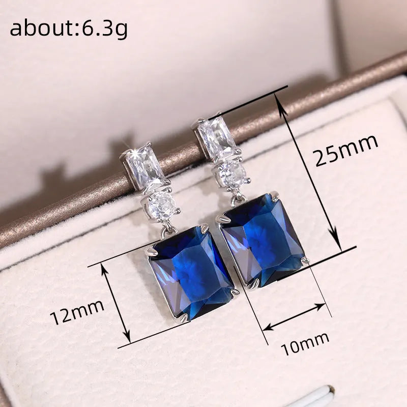 Blue contrast zircon earrings in geometric copper frame with electroplated blue finish