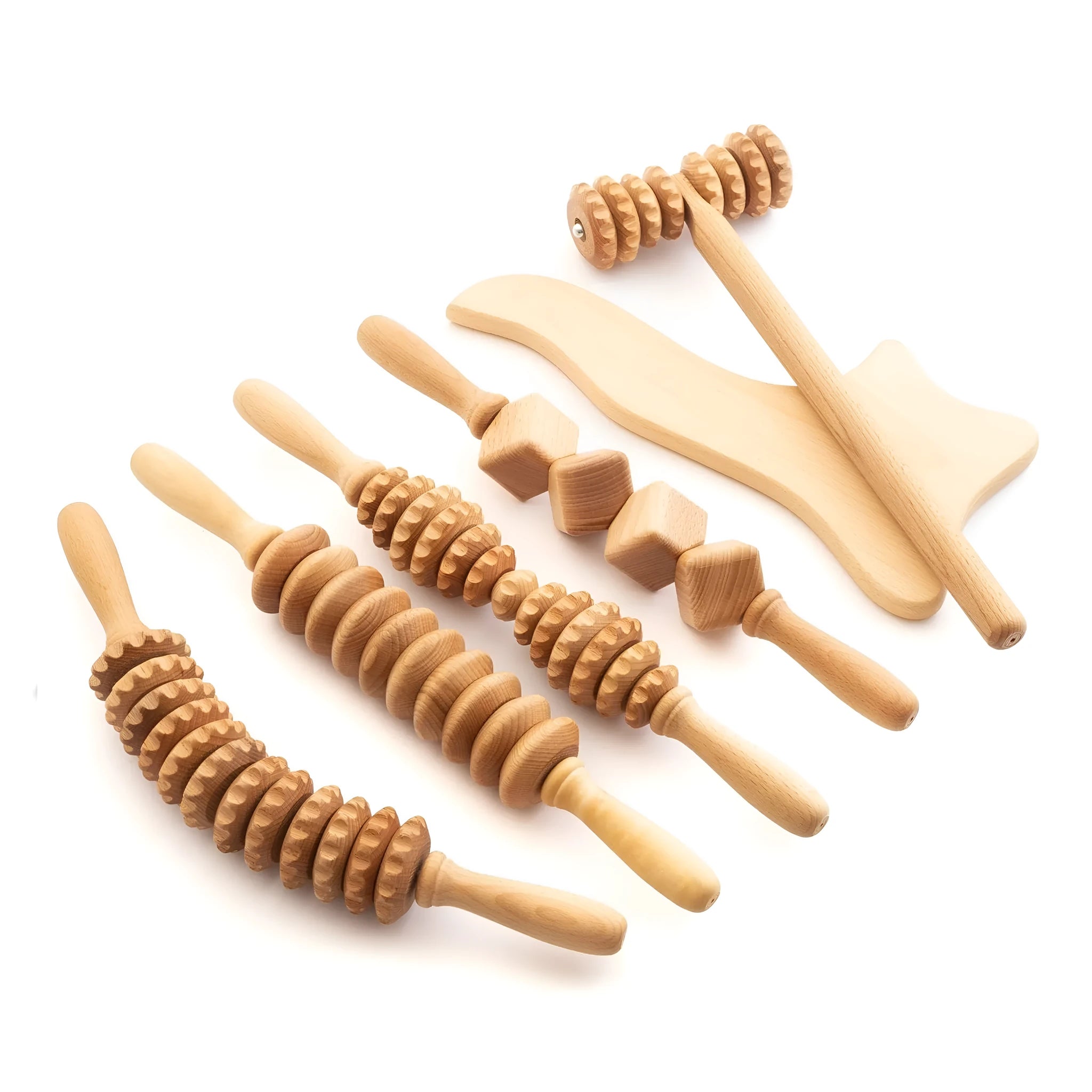 Beech wood massage roller kit showing T-shaped roller and assorted wheeled massagers on a table.