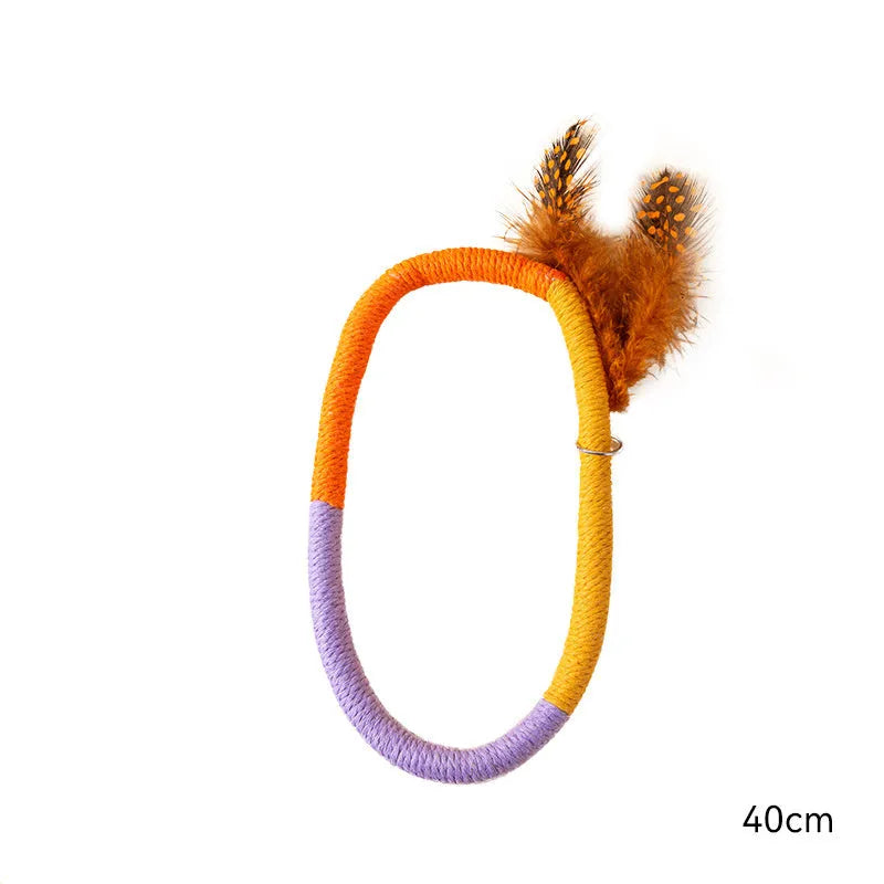Green cotton rope circular cat toy with feathers and catnip for interactive play