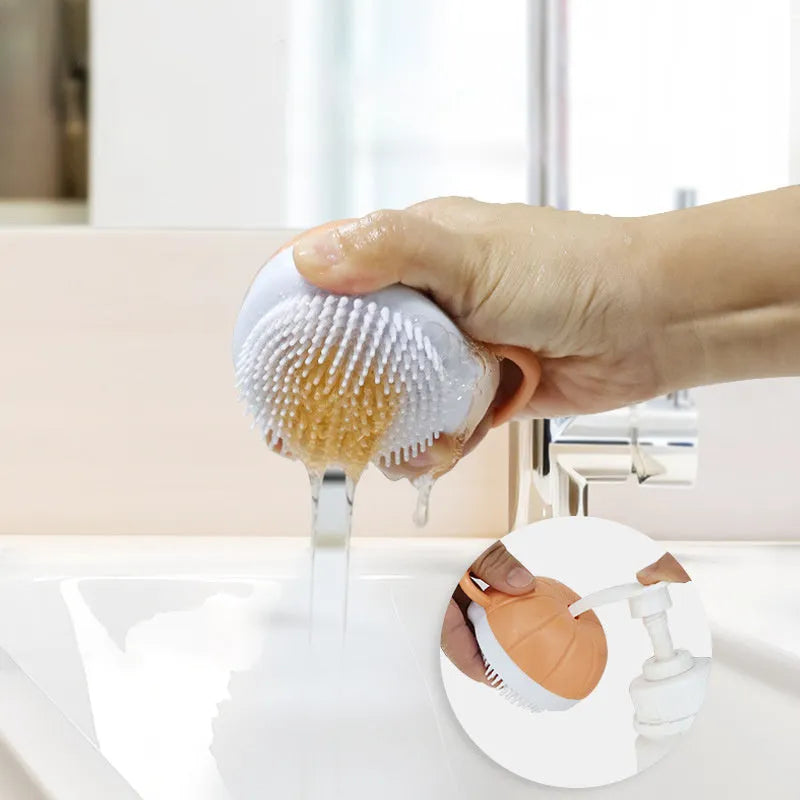 Orange TPR dog shampoo brush with silicone comb teeth and pumpkin-shaped ergonomic handle