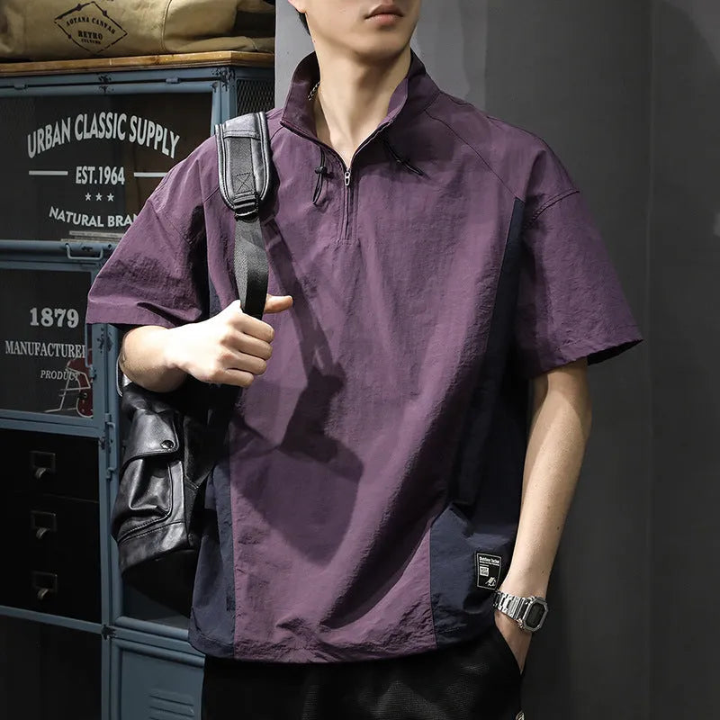 Men's brown half zip stand collar shirt made from ice silk fabric with short sleeves.