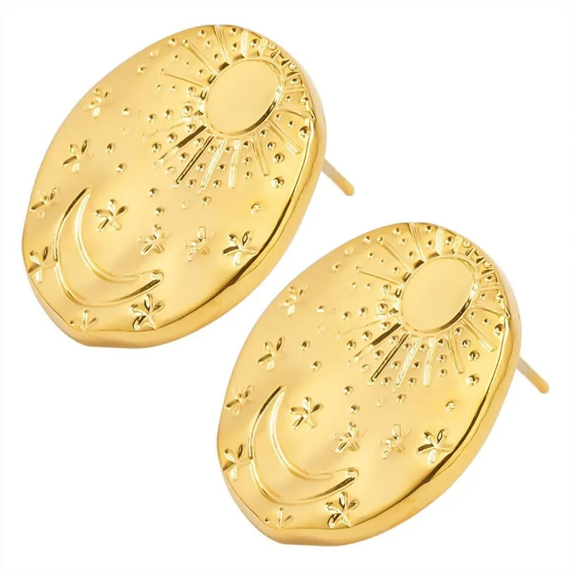 A pair of geometric 304 stainless steel ear studs with shell detailing, shown in a gold electroplated finish.