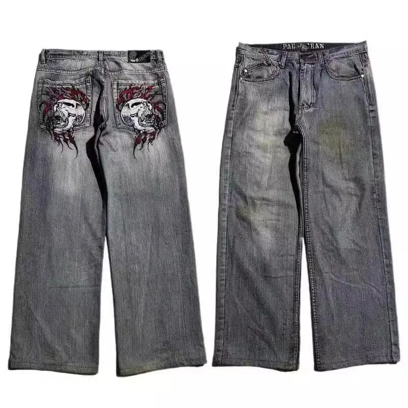 Grey washed wide-leg jeans with straight-leg workwear styling and mid-waist zip fly