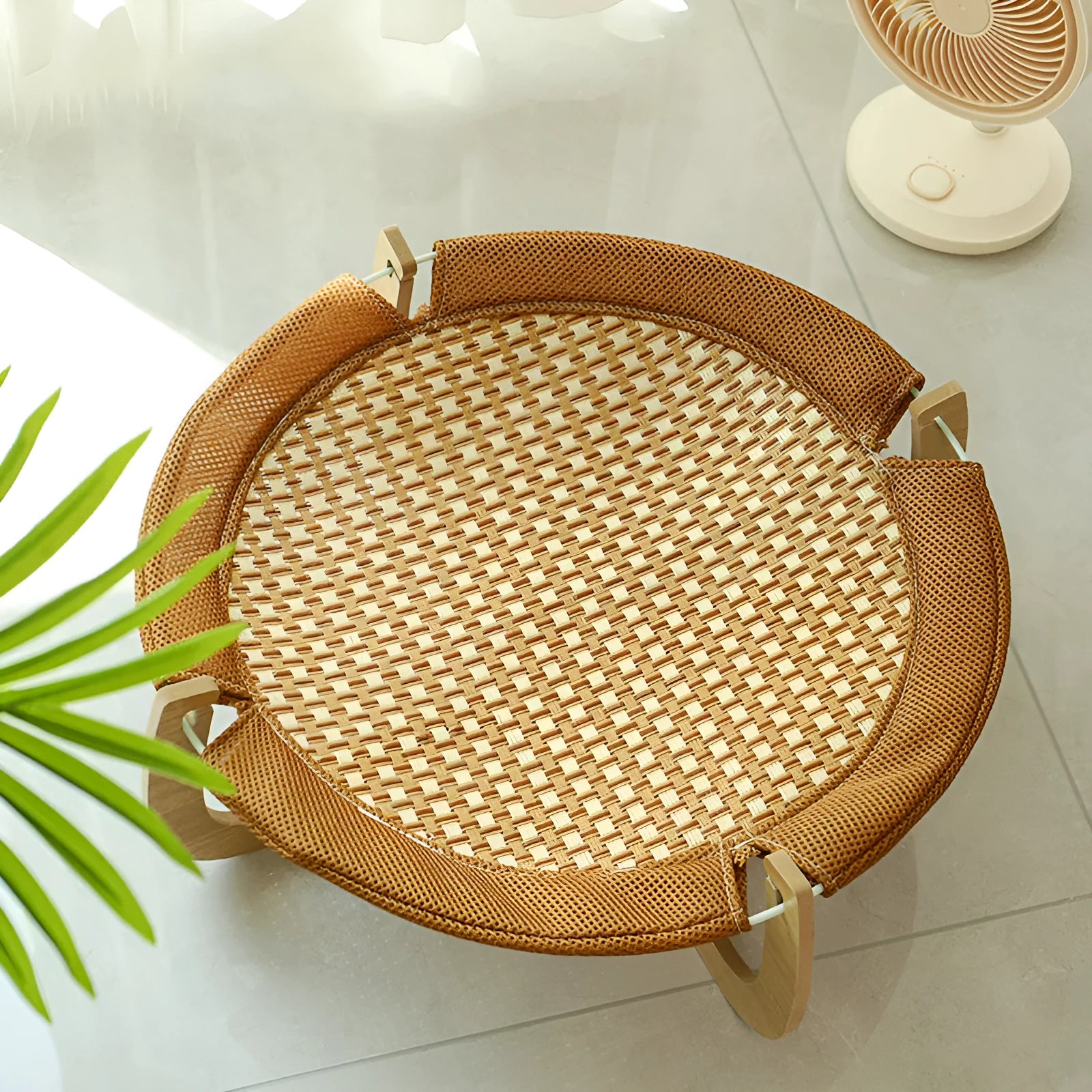 Brown woven rattan pet bed measuring 46x46x17.5cm for cats and dogs