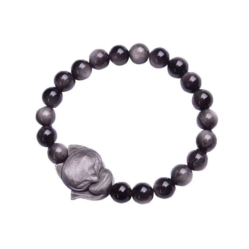 Obsidian fox bracelet with 8mm black stone beads and silver-toned fox charm on wrist
