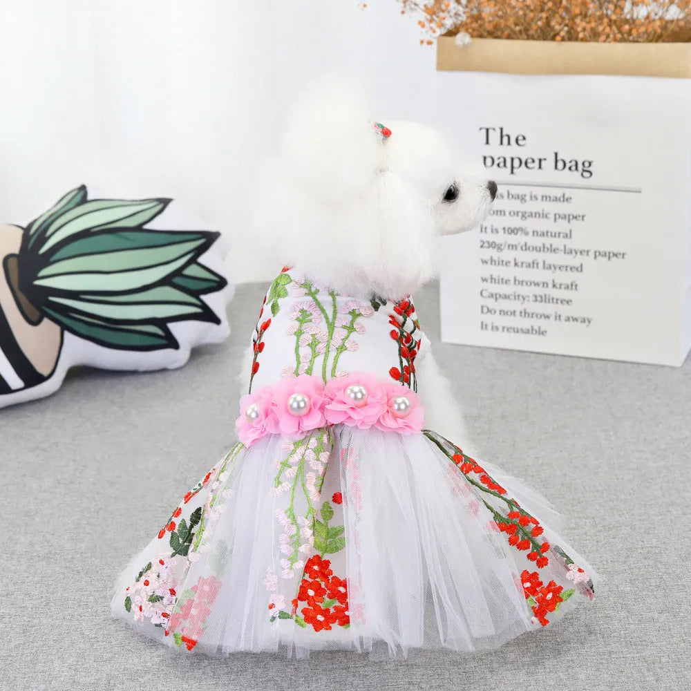 Cotton dog wedding dress in multi-leaf pink princess style on a small dog